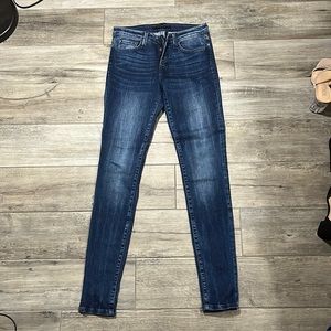 Flying monkey dark mid rise skinny jeans. Never worn. Size 26.